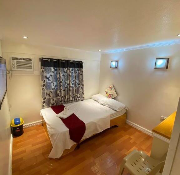 فندق صغير Rj Travellers Inn