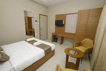 هتل Grand Courtyard Business