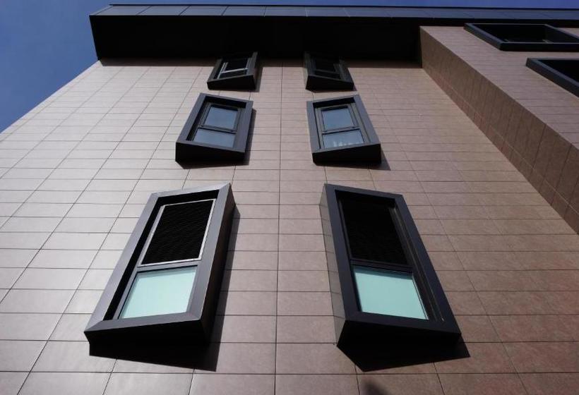 호텔 Hassuites
