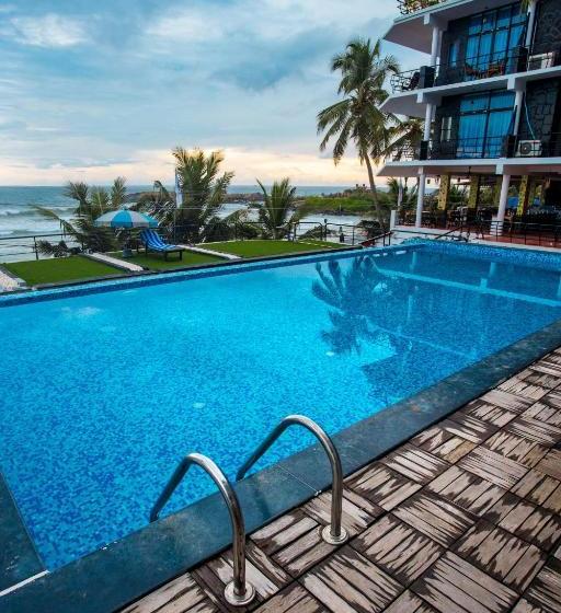 בית מלון כפרי Newton S Neelakanta Boutique Beach Resort