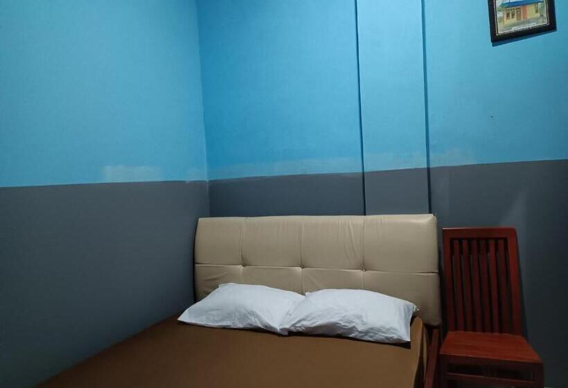 فندق Oyo 93117 Penginapan Tiga Dara