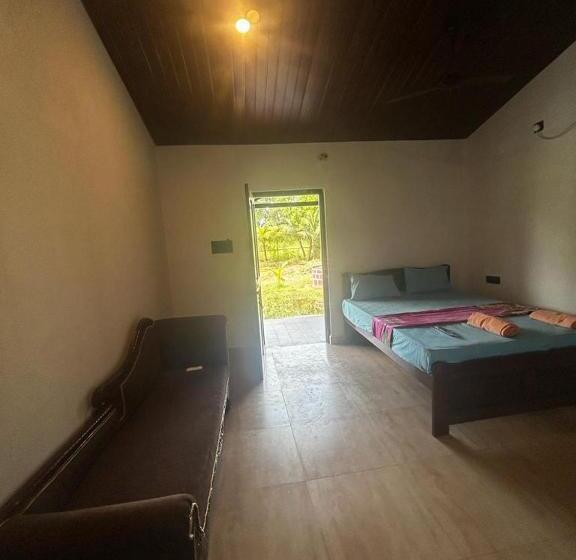 펜션 Comfy Cottages In Saligao