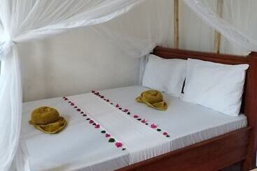 تختخواب و صبحانه Pamoja Beach Stays Hotel In Jambiani