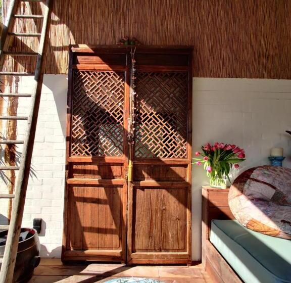 تختخواب و صبحانه De Tuinkamer