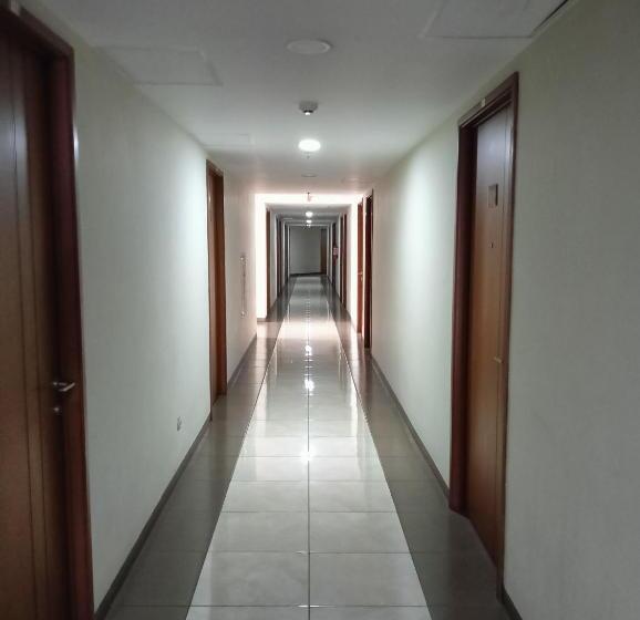 هتل Capital O 93372 Aurora Residence