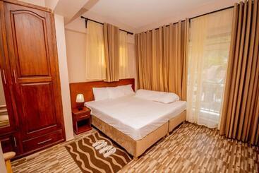 تختخواب و صبحانه Riverpoint Inn, Arusha