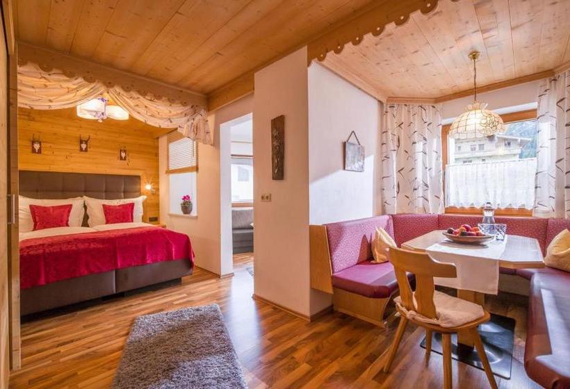 Отель Appartements Enzian