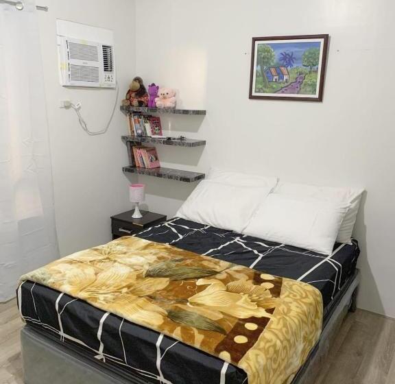 هتل Cozy Loft At Mesavirre Garden Residences