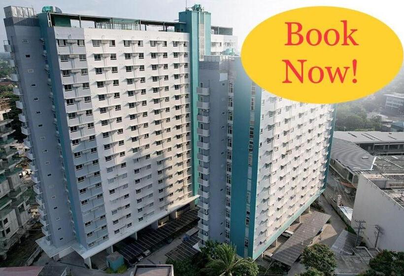 هتل Cozy Loft At Mesavirre Garden Residences