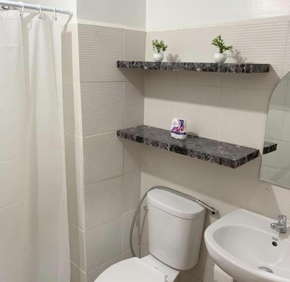 هتل Cozy Loft At Mesavirre Garden Residences