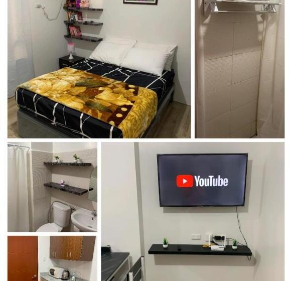 هتل Cozy Loft At Mesavirre Garden Residences