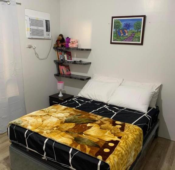 هتل Cozy Loft At Mesavirre Garden Residences