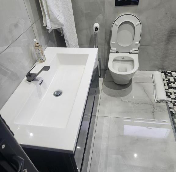 تختخواب و صبحانه The Residence Villa