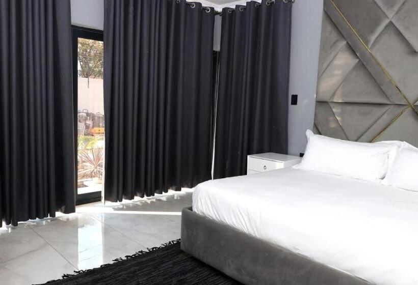 تختخواب و صبحانه The Residence Villa