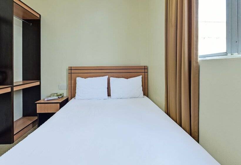 هتل Spot On 92255 Lucky Guesthouse