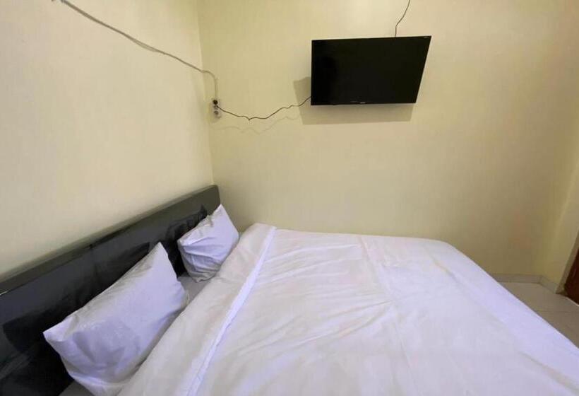 Отель Spot On 93452 Wulan Homestay 2 Syariah