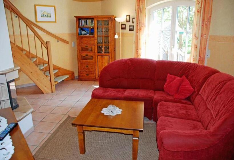 Отель Ferienhaus Unterm Reetdach