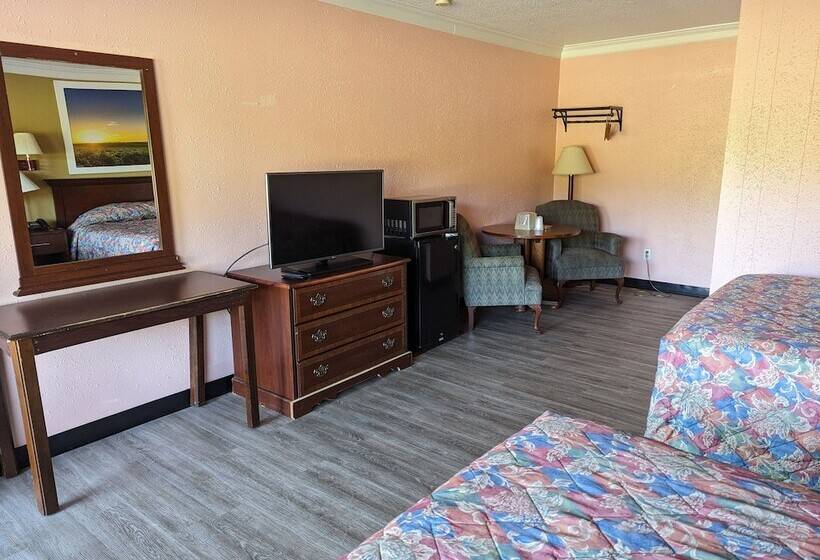 호텔 Travelers Inn