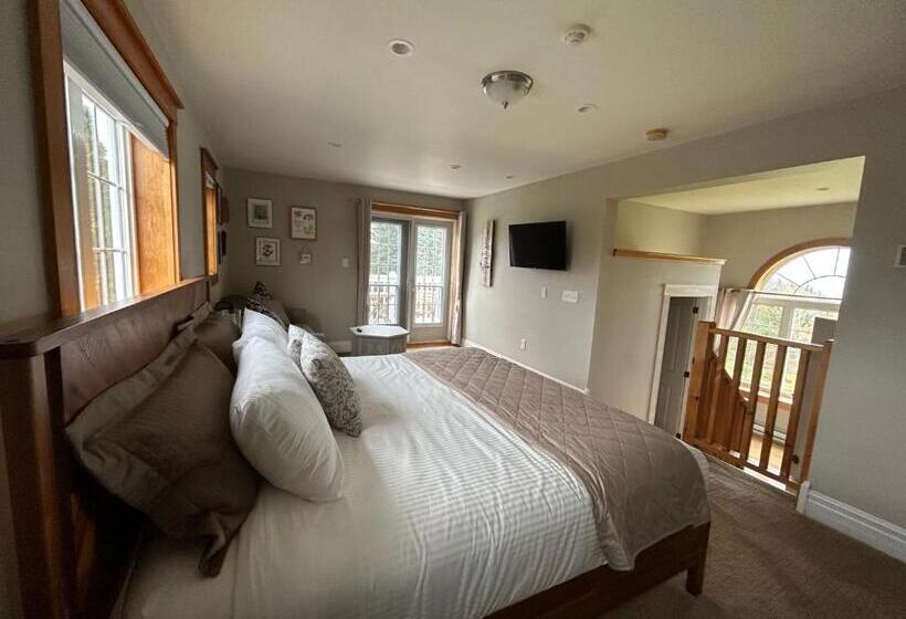 پانسیون Tides Inn Guest Suites
