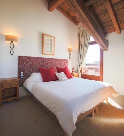 تختخواب و صبحانه La Maison Tamarin