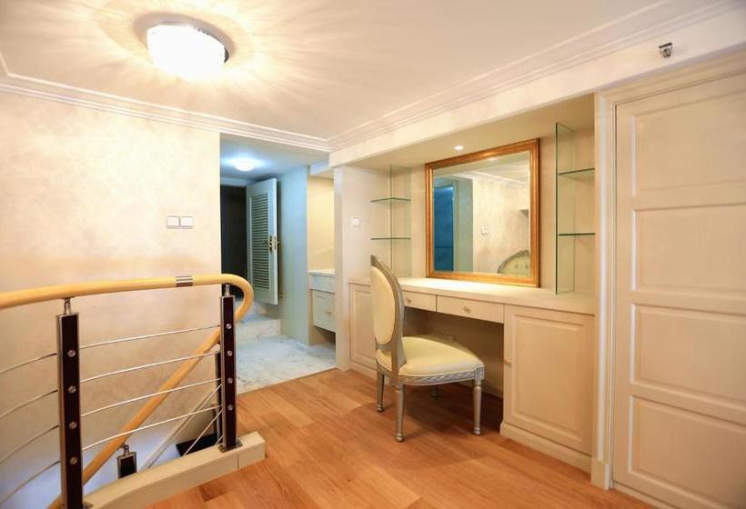 Отель Qingdao Dubai Seven Star Duplex Seaview Apartment