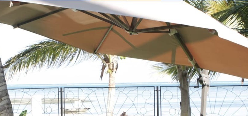 Cowrie Shell Beach Apartments Official