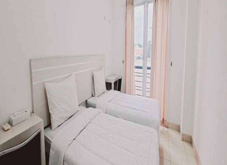 فندق Tos Residence