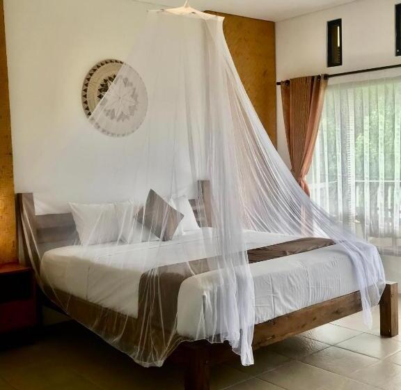 호스텔 Kraras Munduk Guest House & Donbiyu Rendezvous Restaurant