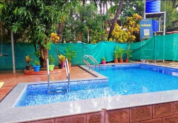 ホテル Vartak Wadi Smita Villa