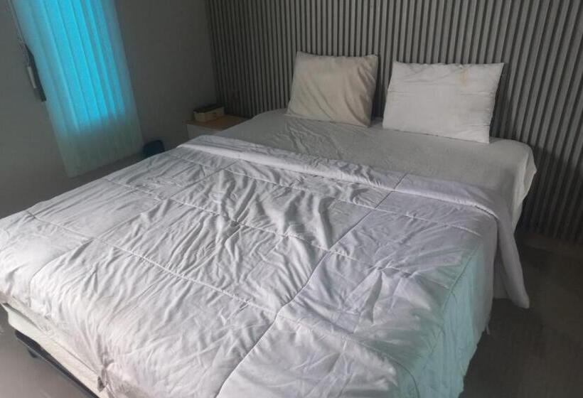 هتل Capital O 93816 Cerry Village