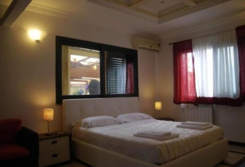 تختخواب و صبحانه Villa Courrier