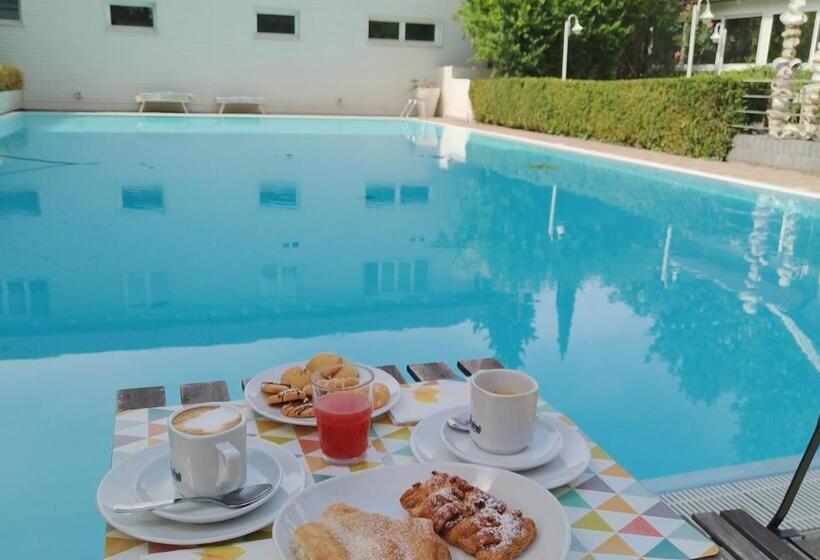 تختخواب و صبحانه Magnolia Room & Breakfast