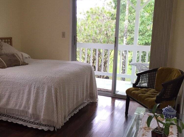 تختخواب و صبحانه Lava Tree Tropic Inn
