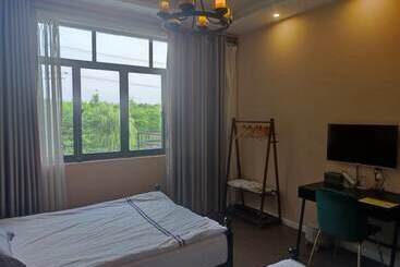 پانسیون Shanghai Hua Xi Shui Xie Guesthouse