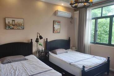پانسیون Shanghai Hua Xi Shui Xie Guesthouse