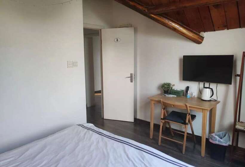 پانسیون Shanghai Hua Xi Shui Xie Guesthouse