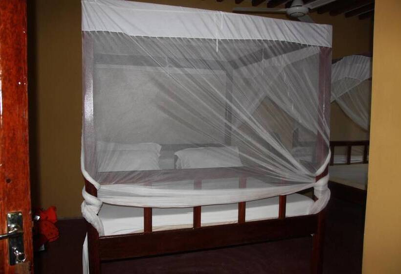 مبيت وإفطار Mpole Bungalows