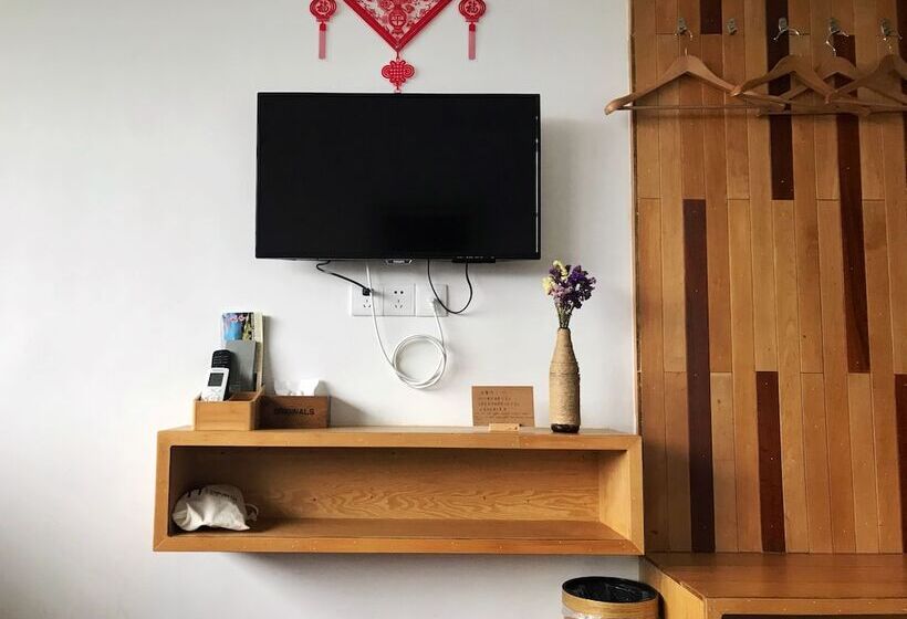 Albergue Travelling With Hotel Long Ji Ping An