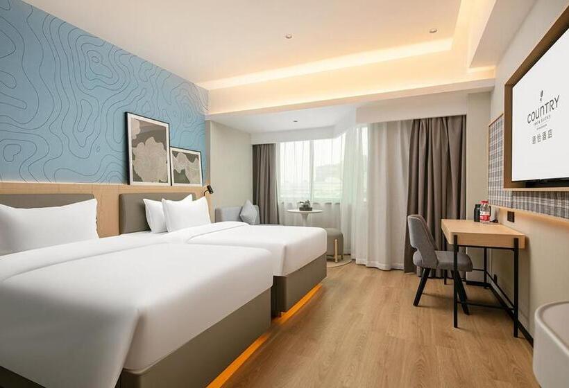 هتل Country Inn & Suite By Radisson, Guangzhou Railway Station Xiaobei