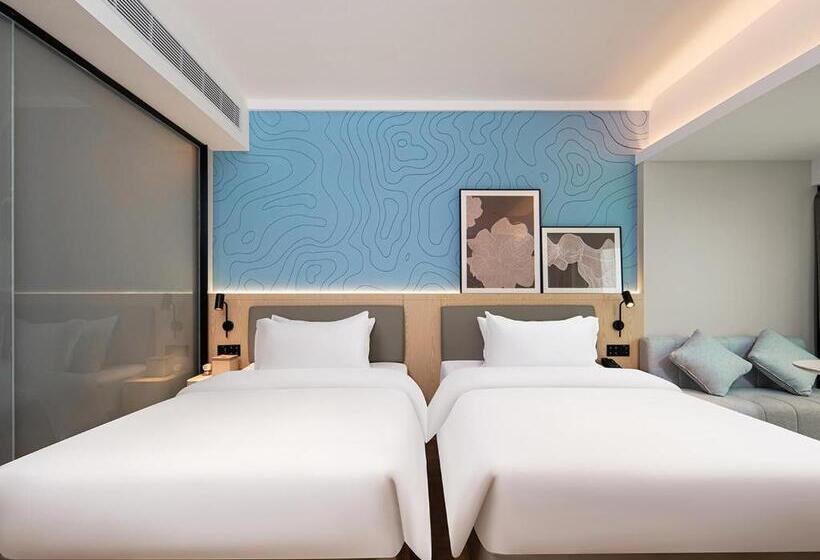 هتل Country Inn & Suite By Radisson, Guangzhou Railway Station Xiaobei