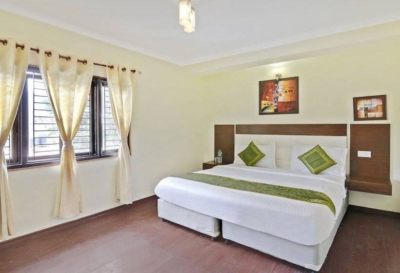 בית מלון כפרי Treebo Trip Lorent Manor Annex