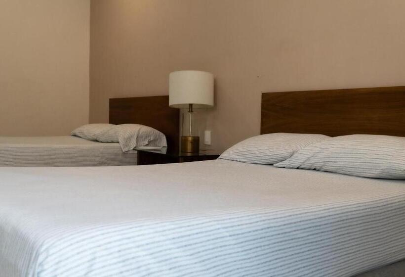 Infinity Suites Habitación Triple 103