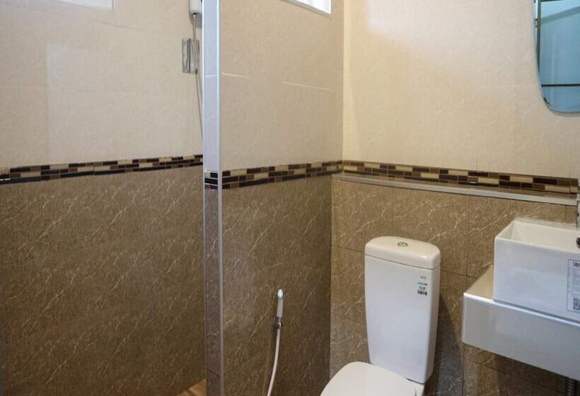 هتل Capital O 75521 Sang Siri Apartment