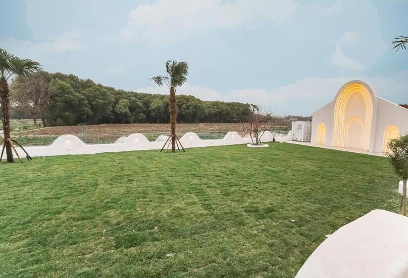 استراحتگاه 上海迪诺星辰度假民宿