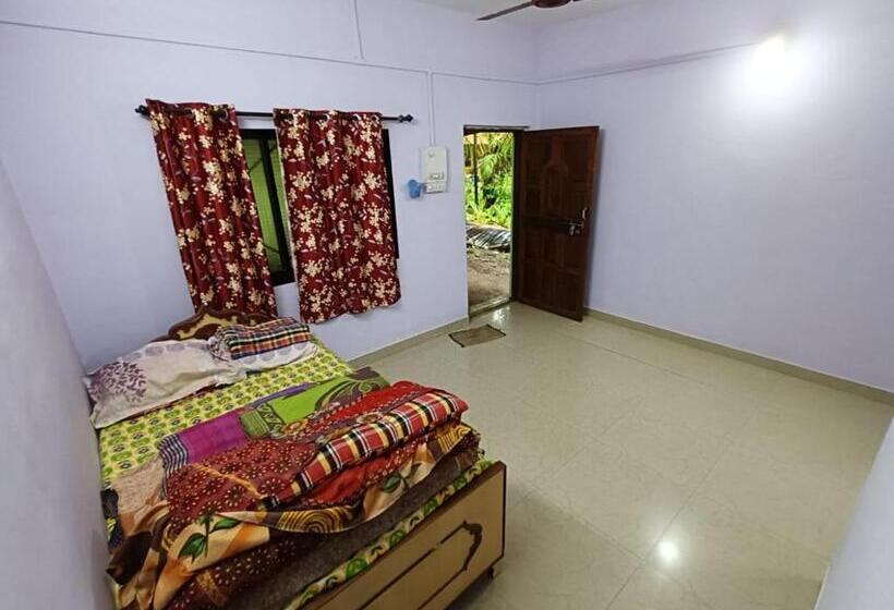호텔 Datta Srushti Cottage Alibaug