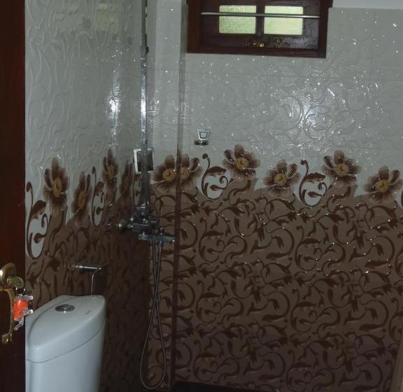 تختخواب و صبحانه New Jaya Villa