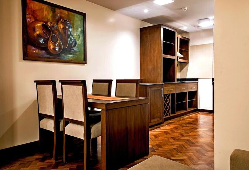 Magna Hotel And Suites