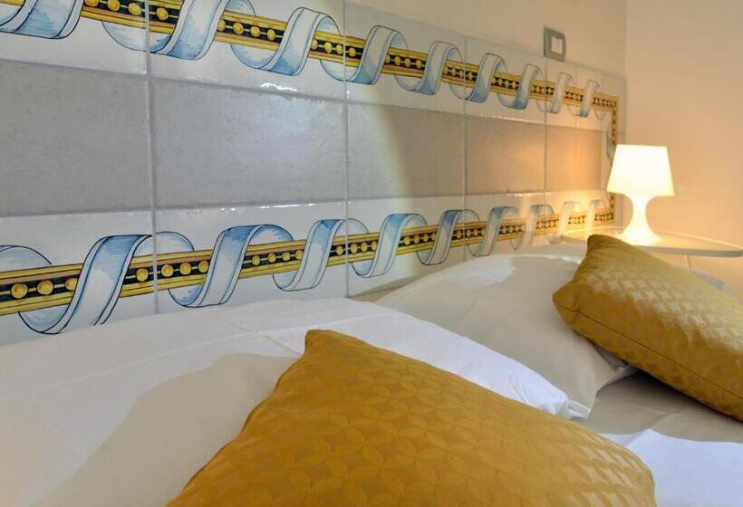 تختخواب و صبحانه Santi E Saraceni Rooms