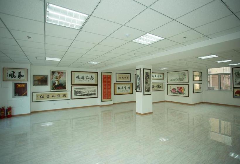 Отель Yantai Dexin International