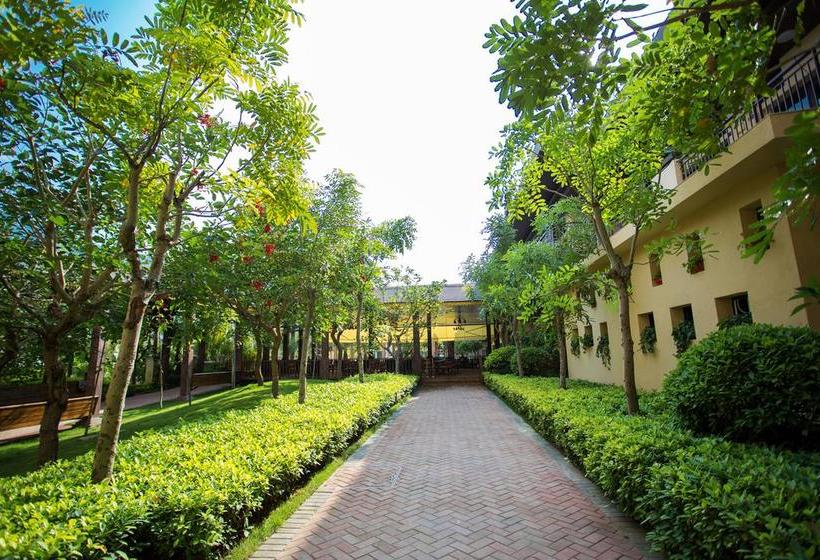 Отель Xishuangbanna Yajule City Golf